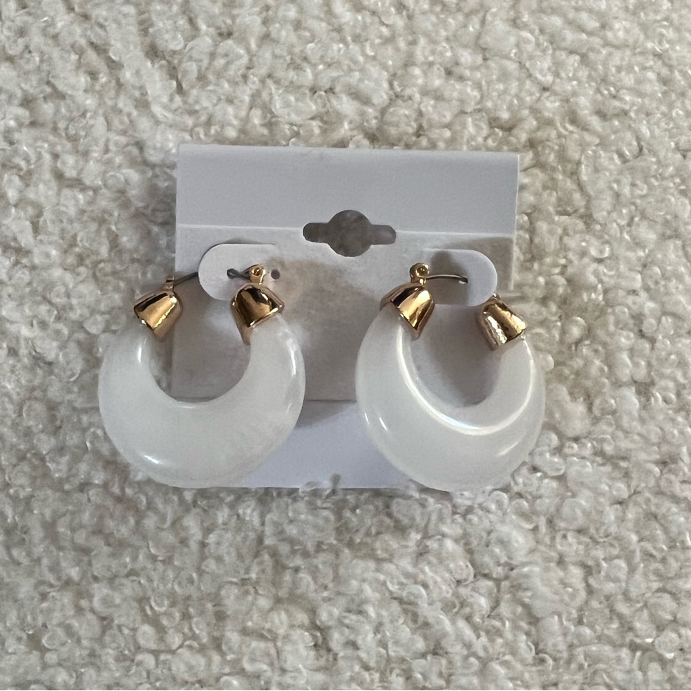 Gold and white resin hoop earrings